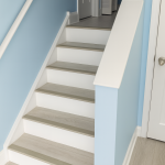 Modern Staircase with Soft Blue Walls